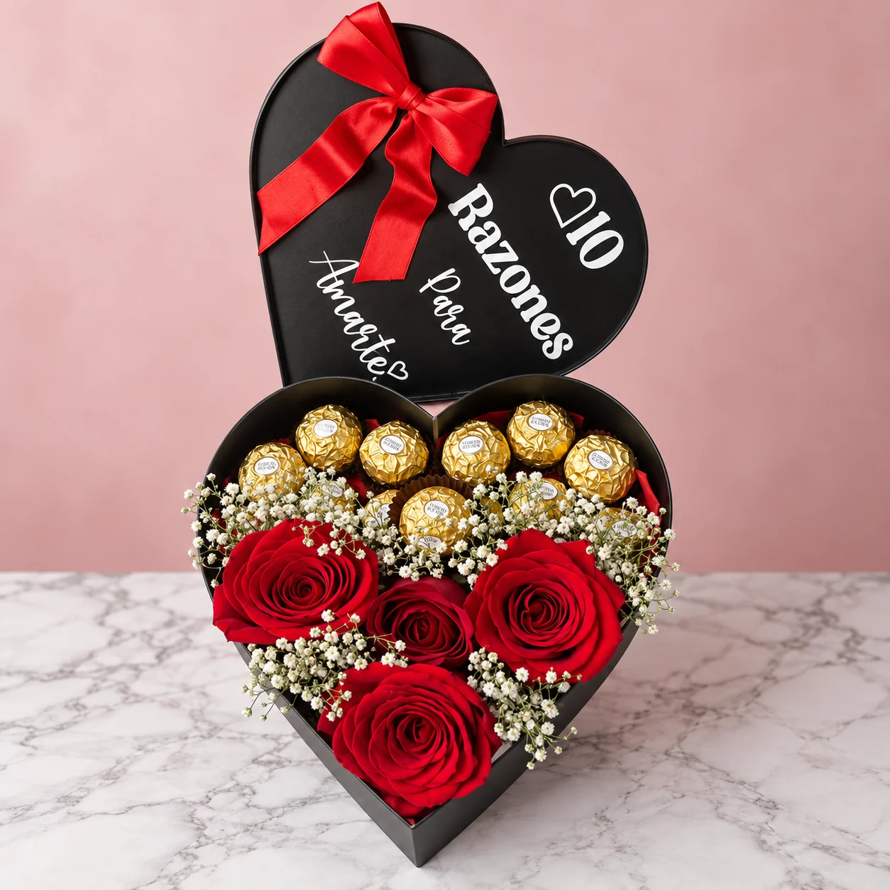 10 Razones para Amarte - Caja corazón negra con 4 rosas rojas, flor nube, 12 Ferrero Rocher y los mensajes de la canción en su interior